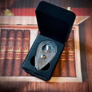 Executioner” – Hand-Engraved Guillotine Cigar Cutter in Steel | Limited Edition SN | Velvet COHIBA Case Included custom engraved custom lighter shown in product photos by The Steel Canvas SKU SIGCUT-01