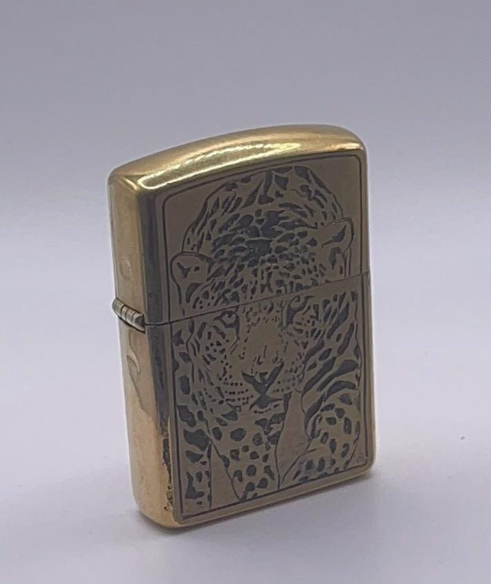 Hand Engraved Brass Zippo Lighter custom engraved custom lighter by The Steel Canvas SKU ZIP-LEO-01