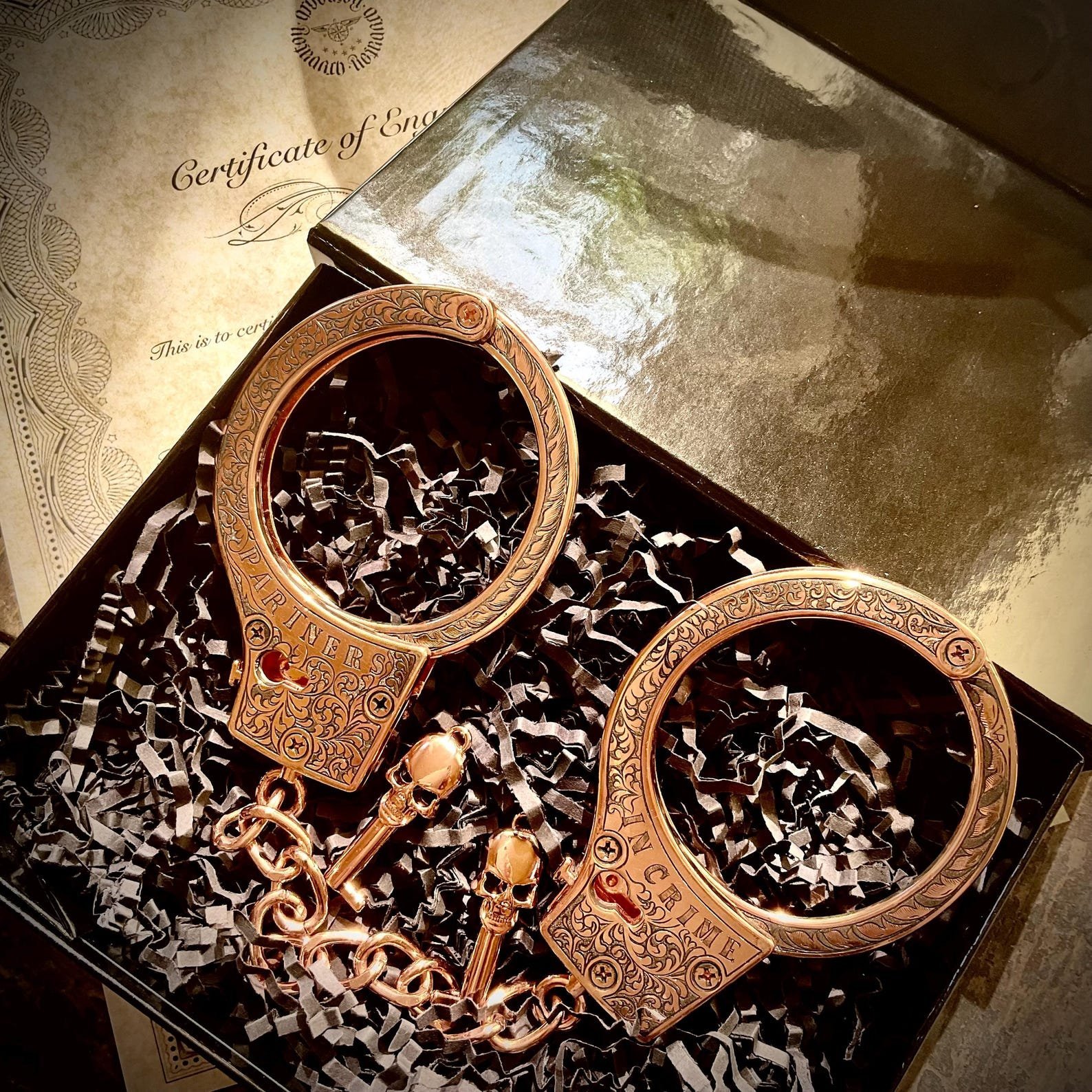 Hand-Engraved "Partners in Crime" Handcuffs custom engraved memorial piece by The Steel Canvas SKU MEM-03