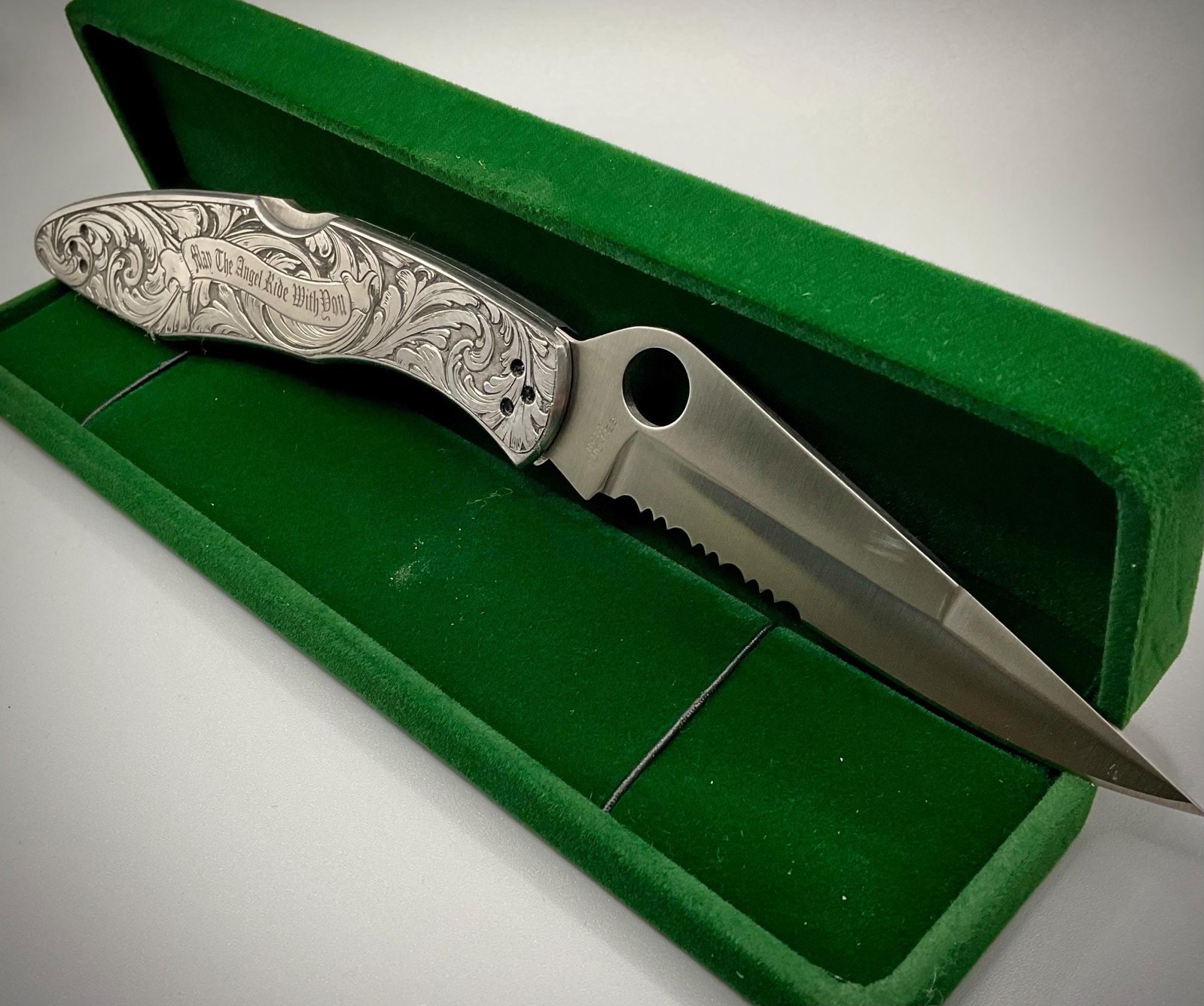 Hand Engraved Spyderco Police Knife – Deep Scrollwork, “May the Angel Ride With You” custom engraved custom knife accessory shown in product photos by The Steel Canvas SKU KN-04