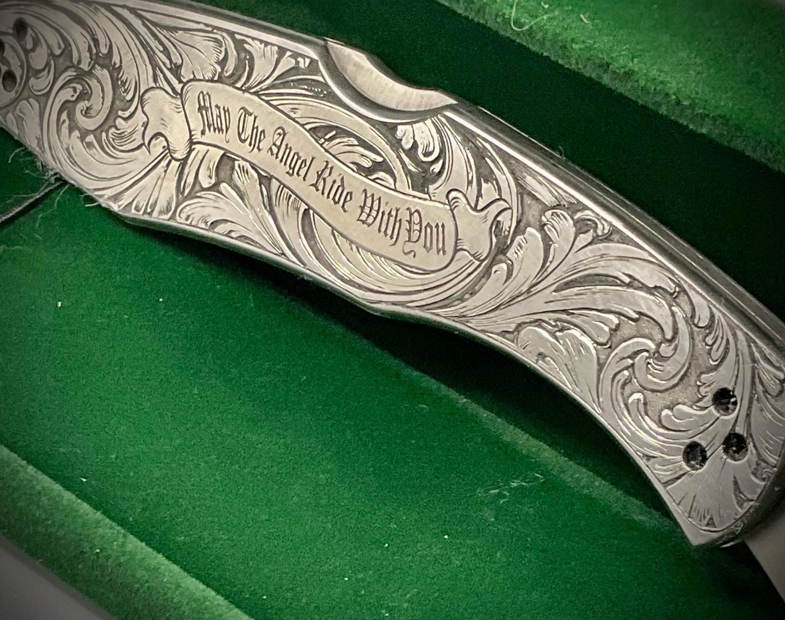 Hand Engraved Spyderco Police Knife – Deep Scrollwork, “May the Angel Ride With You” custom engraved custom knife accessory shown in product photos by The Steel Canvas SKU KN-04