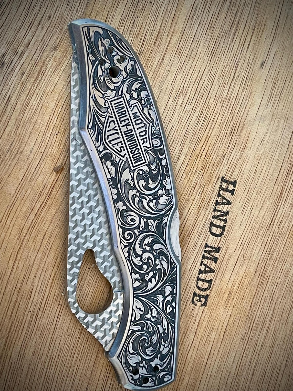 REAR FIND Unique hand engraved Harley Davidson Spyderco knife with laser engraved blade custom engraved motorcycle accessory shown in product photos by The Steel Canvas SKU KN-02