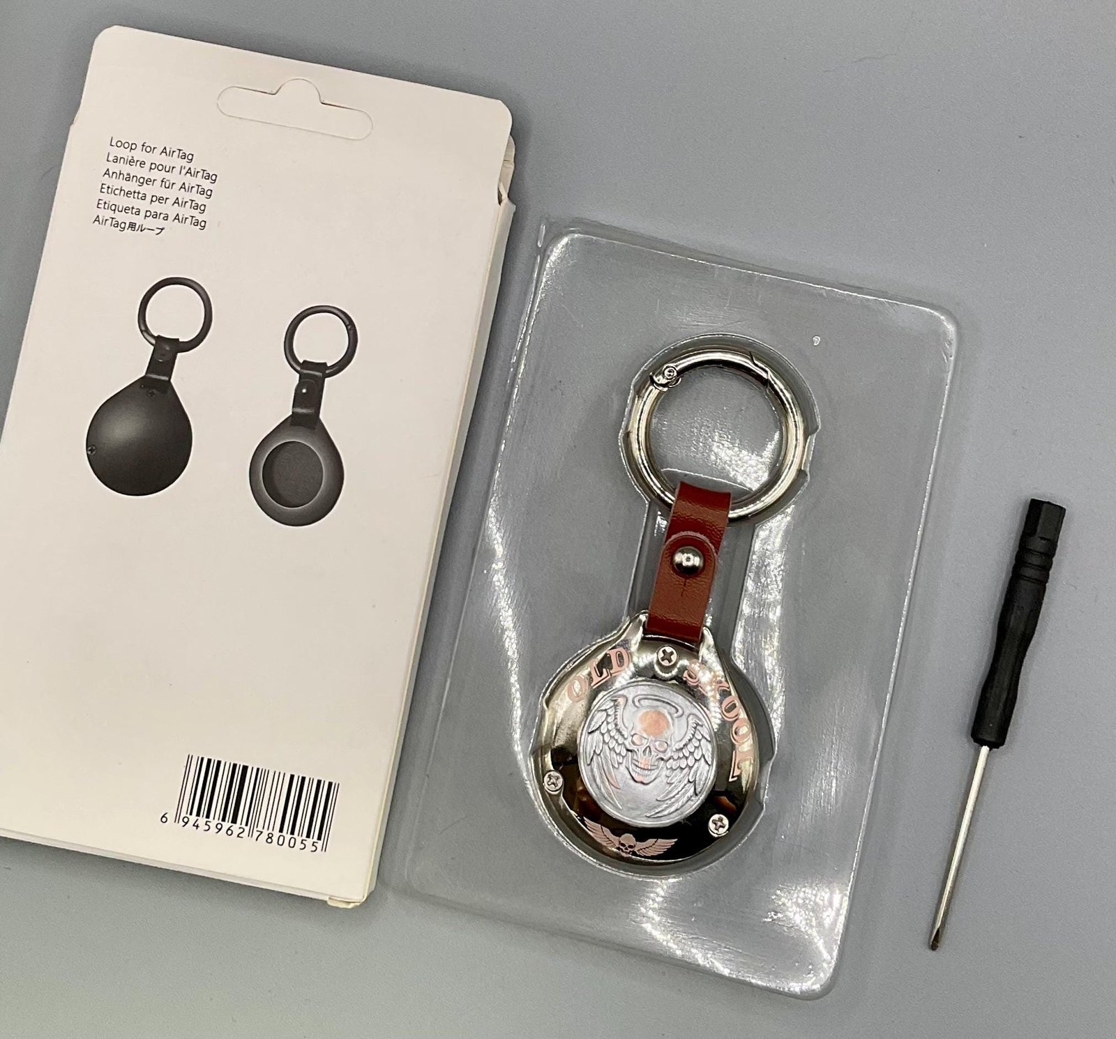 Harley “Old Skool” Sculpted AirTag Holder – Handmade Metal Keychain for Riders (AirTag Not Included) custom engraved motorcycle accessory shown in product photos by The Steel Canvas SKU HD-KEY-01